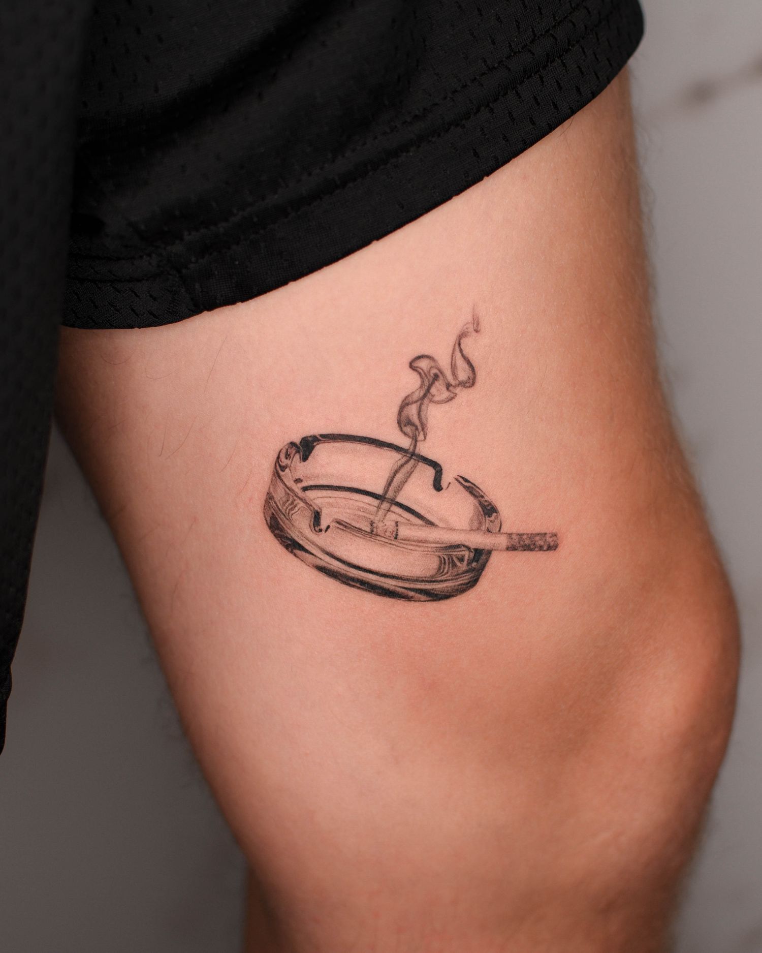 Tattoo — ashtray and cigarette